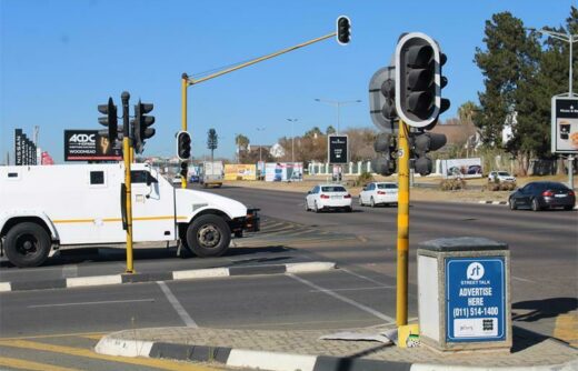 A white van stopping at a crossing