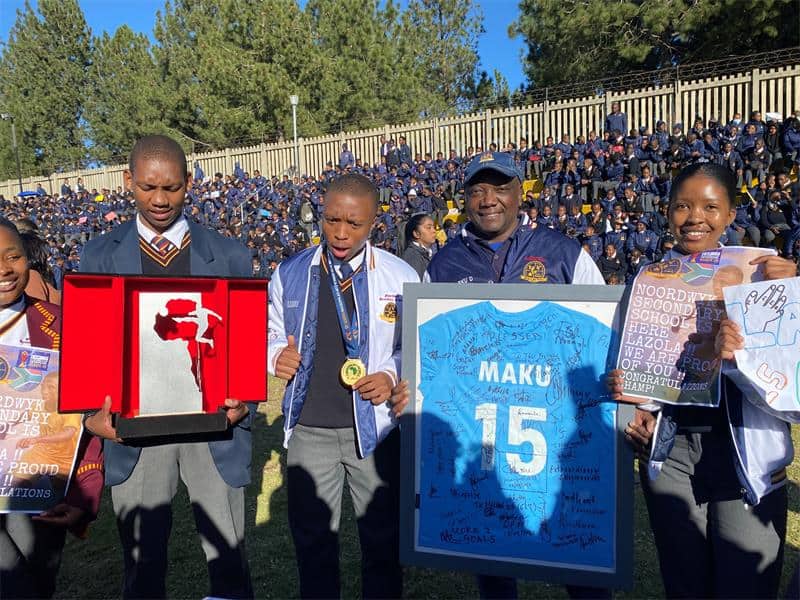 The Noordwyk Secondary School grounds roared to resounding cheers and jubilation when Lazola was driven through a guard of honour.