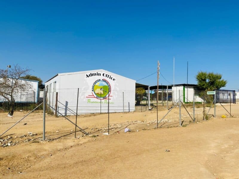 Despite some progress, the school still faces challenges with sanitation and access to digital learning tools.