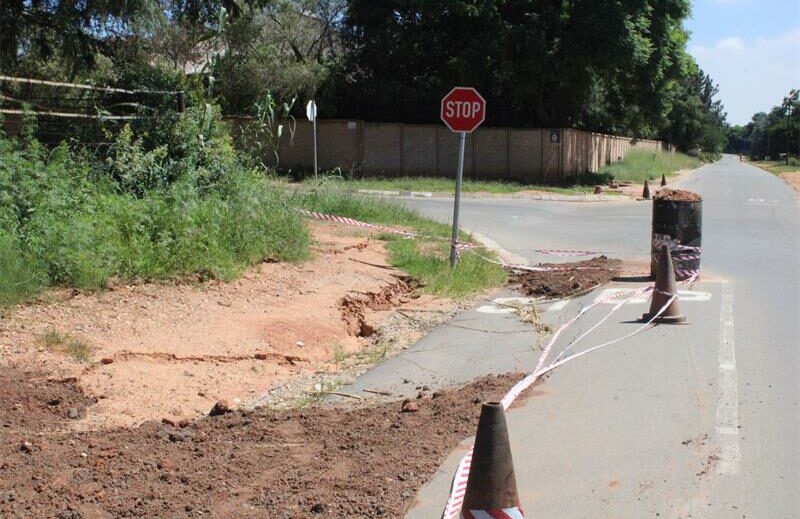 The sinking corner of Hampton and George roads remains untouched as JRA resurfaces other roads in Glen Austin. Photo take on February 26, 2025. Photo: Comfort Makhanya
