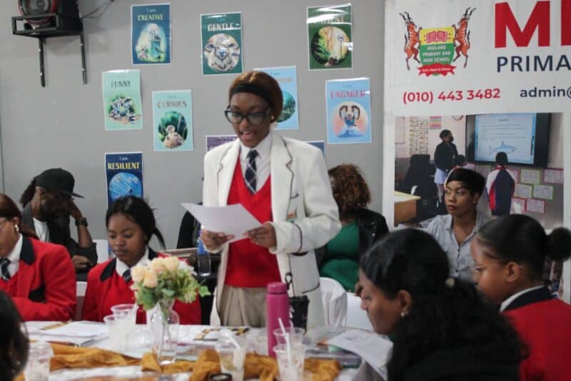 Midland International School Grade 12 learner Malima Kamva reads the pledge on October 17. Photo: Supplied