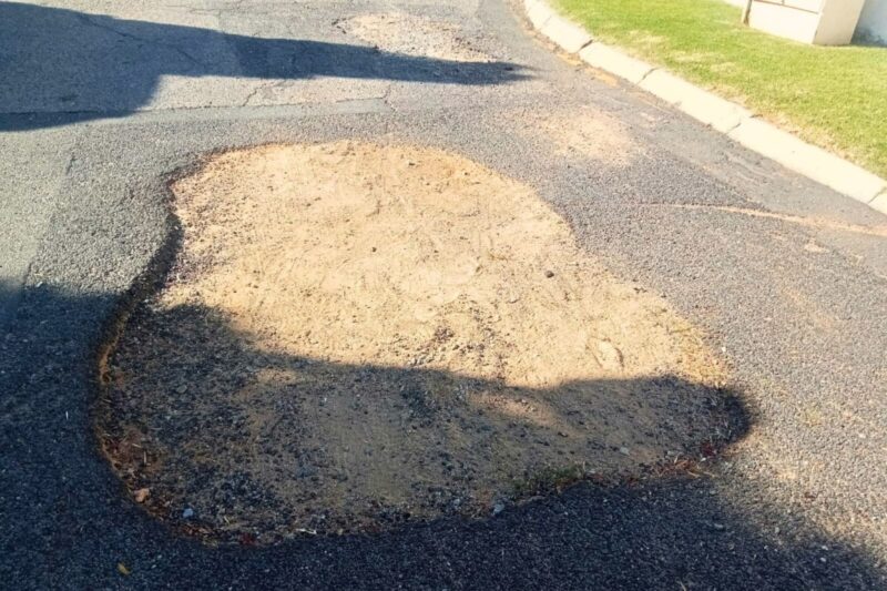 Midrand residents, battling a constant battle with potholes, claim some have lingered for years, despite repeated reports to JRA.