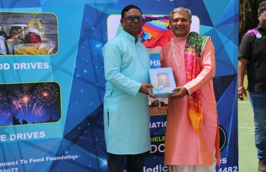 Consulate official, Anil Buradkar and Head priest, Guruji Kirit Bhai Acharya