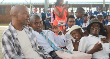 Sylvester ‘Mavesta’ Mofokeng chills with the Mayibuye teens during the Inspiring the Next Gen Programme on April 1. Photo: Comfort Makhanya