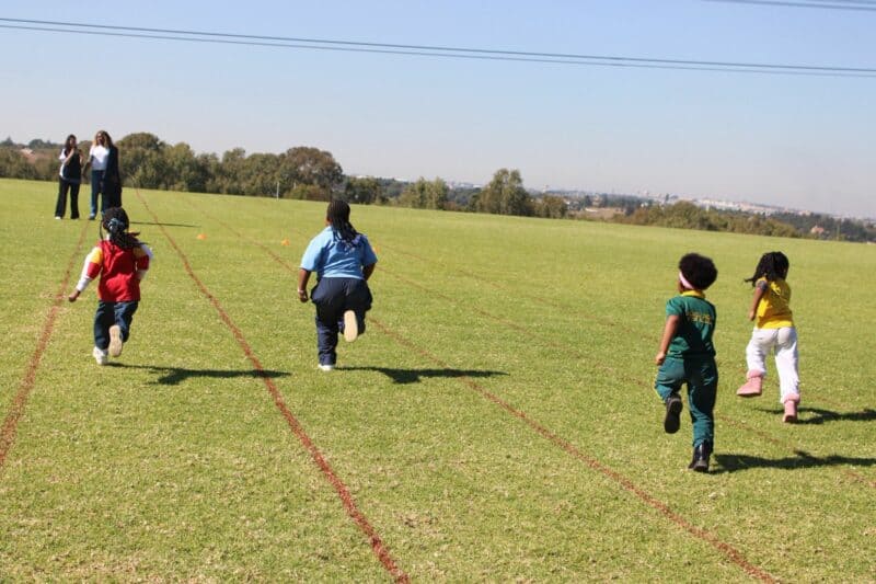 Blue Hills Preparatory and Childsol Crèche & Pre-School Grade R learners sprint at the mini-Olympics. Photo: Zanele Mfaba