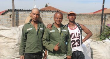 Members from the Ubuntu Rabie Ridge Foundation, Brandon Abrahams, founder George ‘LoveG’ Henry, and Marvin Day on May 28. Photo: Comfort Makhanya
