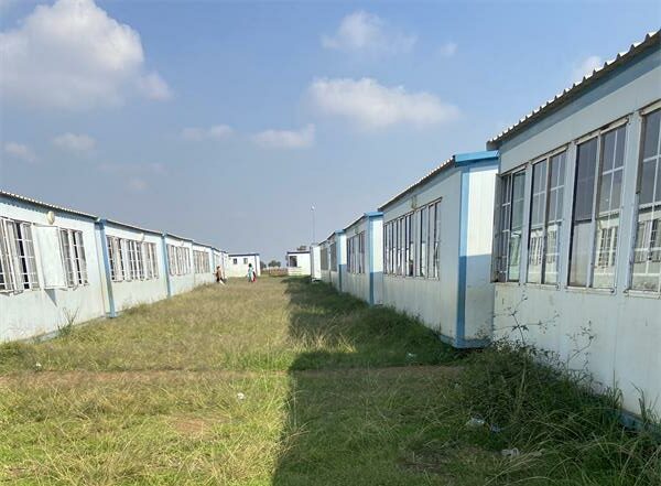 Parents also attended to the uncut grass at Dulcie September Primary School on May 30, 2026. Photo: Comfort Makhanya
