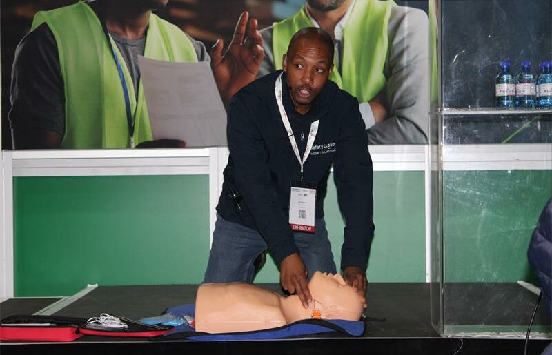 General trainer Jack Masekwameng holds a first aid awareness session for attendants and teaches them how to perform CPR. Photo: Zanele Mfaba