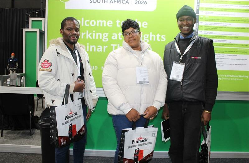 Attendants Tshepiso Tsotetsi, Ntswaki Thekiso, and Motheo Ngomane during the exhibition. Photo: Zanele Mfaba