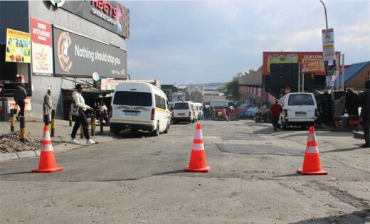 JRA blocks off the road to start repairs of the potholes. Photo: Zanele Mfaba