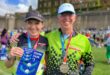 Sharon and Duane Newman after receiving their permanent numbers at the Two Oceans Marathon this year. Photo: Supplied