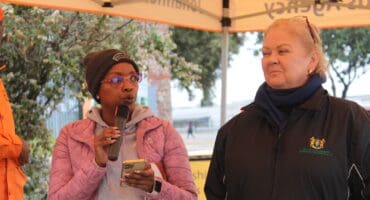 Ward 112 councillor Lerato Mphefo and Ward 132 councillor Annette Deppe address residents and city officials during the launch of Operation Restore in Midrand on June 18. Photo: Comfort Makhanya