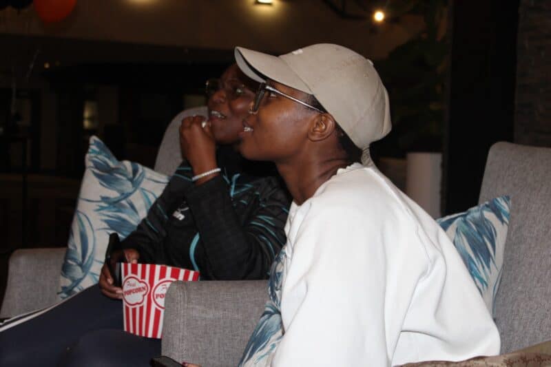 Khanyisa Mpisane and Tandile Ndzululeka watch and anticipate on Bafana's win at the Protea Hotel on June 18. Photo: Zanele Mfaba