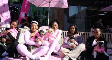 Angela Slique, Aobakwe Seepolle, Innocentia Masombuka, Naomi Kekana, and Teelo Mathabe hold some of the Woodrock puppies after their yoga session. Photo: Zanele Mfaba