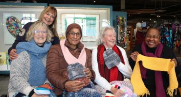 Jackson's Kyalami manager Charmaine Marchesi joins the Knit and Natter group, including Jo Iverson, Lorain Ruthilal, Carol Thornton, and Plantina Seepe-Nkuzana, after knitting for the day. Photo: Zanele Mfaba