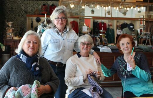 Sheila Evers, founder of Knit and Natter, Sarah Welton-Blake, Tracy Beyleveld, and Linda Joseph about to wrap up knitting and gather all they have knitted for the day. Photo: Zanele Mfaba