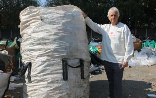 Ward 94 councillor David Foley next to the untidy recycling waste at the recycling site. Photo: Zanele Mfaba