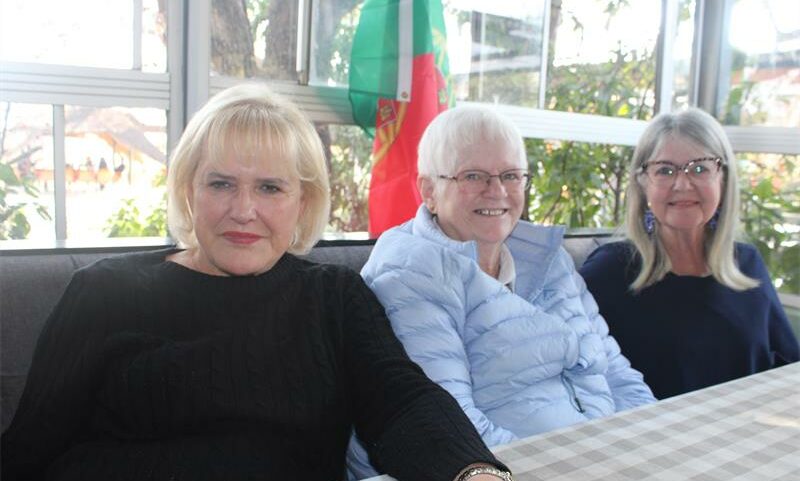 Friends and members of the Over 60 Club, Franci Price, Jessica Barlow and Marilyn Barnard, share a table and a meal at their lunch gathering. Photo: Zanele Mfaba
