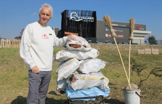 Ward 94 Councillor David Foley next to some of the goods sold by the hawkers at the M71 opposite the Kyalami Corner. Photo: Zanele Mfaba