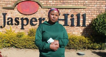 One of the trustees and a resident of the Jasper Hill complex, Portia Ngwepe who is disappointed with City Power for the constant and prolonged power outages they have been experiencing. Photo: Zanele Mfaba