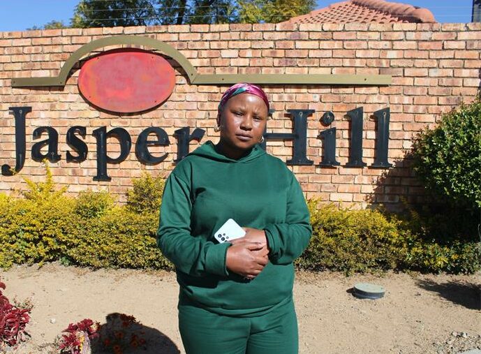 One of the trustees and a resident of the Jasper Hill complex, Portia Ngwepe who is disappointed with City Power for the constant and prolonged power outages they have been experiencing. Photo: Zanele Mfaba