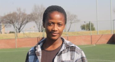 Kearabilwe Mashiane, a player and newly appointed member of Tsa Kasi Tennis Club's executive committee, hopes to inspire more young people to embrace tennis. Photo taken July 17. Photo: Comfort Makhanya