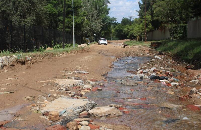 State Road in President Park will remain a gravel road for the foreseeable future after the JRA revealed that budget cuts have forced it to prioritise projects already under construction.