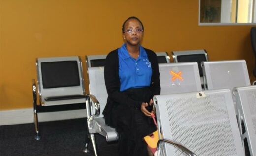 Ward 117 councillor Lerato Mphefo, sits in the waiting area inside the revenue services department. Photo: Zanele Mfaba