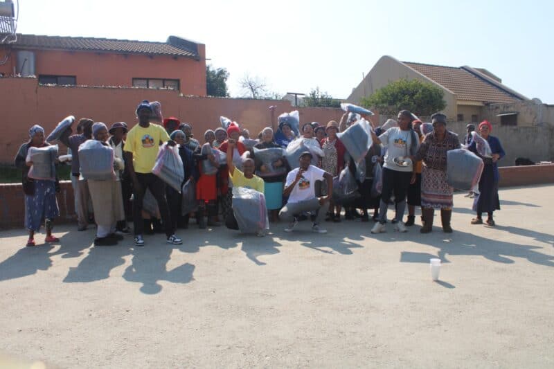 Following successful youth-focused initiatives, the Ubuntu Rabie Ridge Foundation shifted its attention to senior citizens with a blanket donation and community soup kitchen.