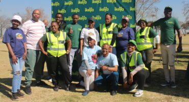 Ubuntu Rabie Ridge Foundation and Ikeja Wireless representatives partnered to commemorate Mandela Day by supporting local football and cricket players with winter gear on July 17 at Rabie Ridge Stadium. Photo: Comfort Makhanya