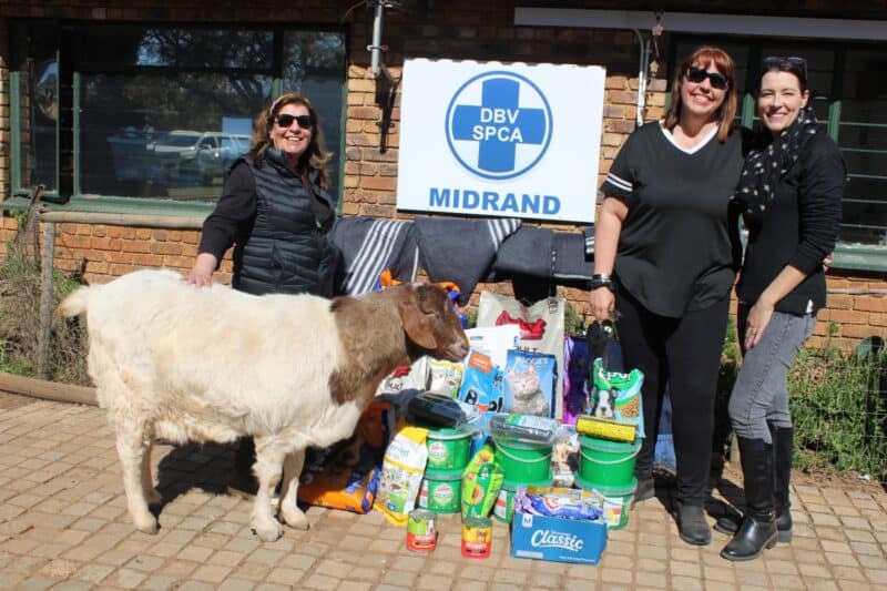 Donors Lynne Maclean, Patricia Nementzik, and Midrand SPCA Volunteer/Chairperson Brenda Lucas after the handover of pet food, blankets, and cleaning supplies to the SPCA on Mandela Day. Photo: Zanele Mfaba