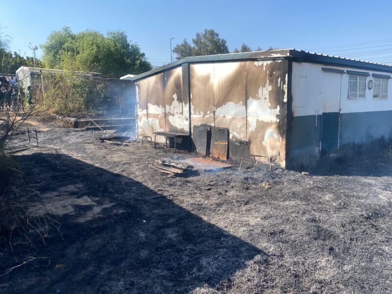 Burnt container classrooms at Mayibuye High School following a fire that broke out on the morning of July 31, 2026. Photo: Comfort Makhanya