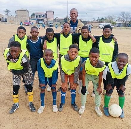 Coach Tefo Phillip Mollo, with Allandale Ext 1 FC, line up for a photo right before a tournament. Photo: Supplied