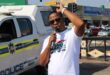 Region A March and March coordinator and convener Thabiso Gerald Mehlape, addresses the protesters and the community members before the march begins to Midrand High. Photo: Zanele Mfaba