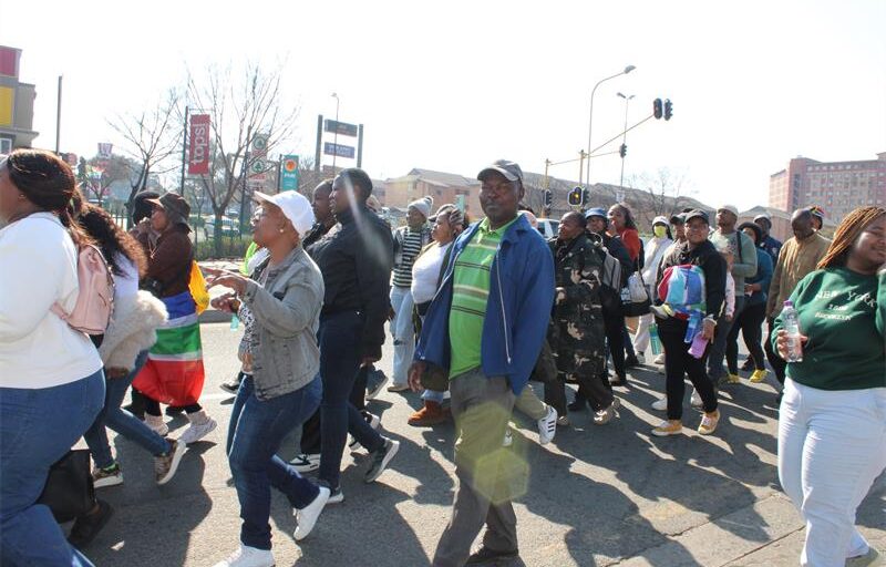 Members of the March and March and unemployed teachers march with their CVs to Midrand High. Photo: Zanele Mfaba