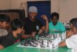 Coach Kgosimang Molefe guides Midrand Chess Club players through key chess strategies during their latest training session on August 22, 2026. Photo: Comfort Makhanya