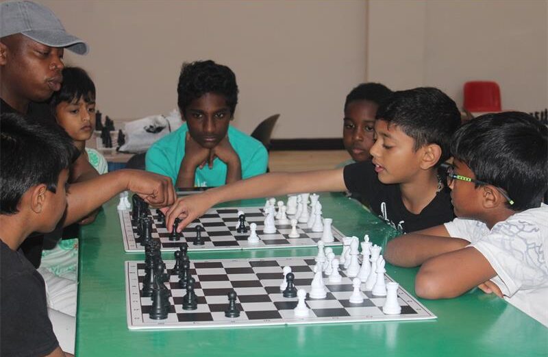 Midrand Chess Club coach Kgosimang Molefe focuses on opening preparation and middlegame strategy with players during training on August 22, 2026. Photo: Comfort Makhanya