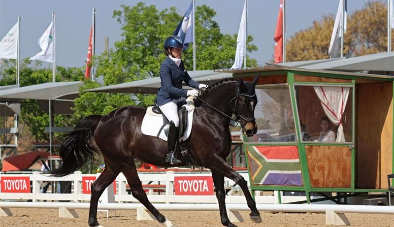 Siobhan Records competes at the 2025 Toyota SA Dressage Championships on Martini Ebony Rose, owned by Claire Martin. Photo: Denford Studios