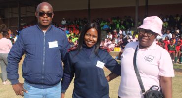 Rabie Ridge Clinic professional nurses Senana Mokoana and Precious Malukeka with health promoter Easter Ramphabane on August 8 at Rabie Ridge Stadium. Photo: Comfort Makhanya