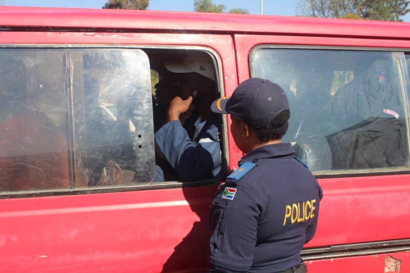 Operation commander Lieutenant Colonel Thabitha Nthabiseng Magowa speaks with passengers of a taxi stopped at the roadblock on August 19, 2026. Photo: Comfort Makhanya