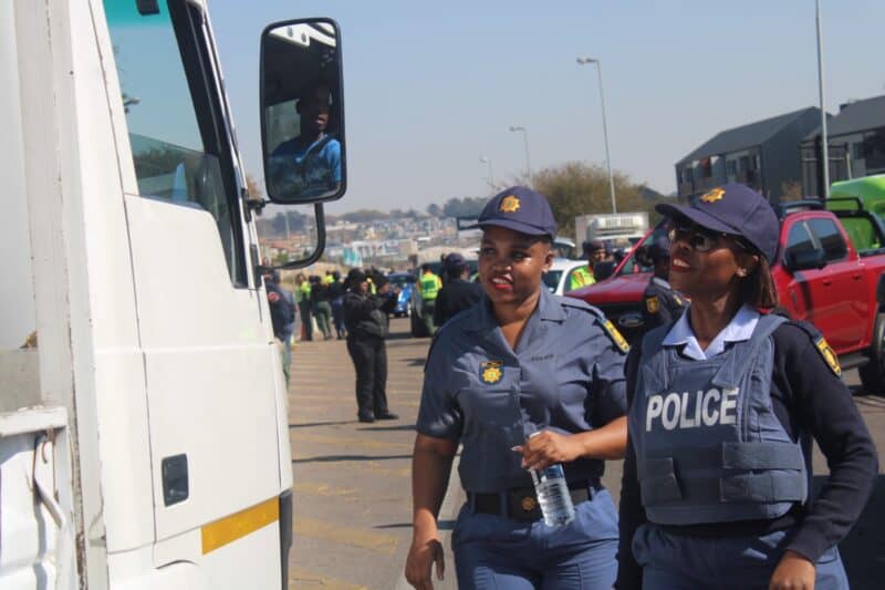 Midrand police officers approach a vehicle during the Operation Basadi roadblock on Olifantsfontein Road on August 19, 2026. Photo: Comfort Makhanya