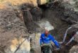 The dug-up area left at the Kyalami Estate property after the initial repair work. Photo: Supplied