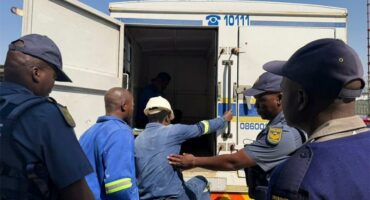Workers are escorted by officials during the multidisciplinary inspection led by Deputy Minister Jomo Sibiya and Executive Mayor Dada Morero on September 2. Photo: Labour Department X page.