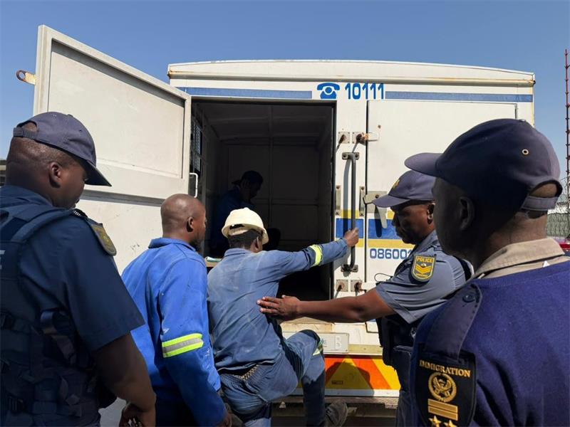 Workers are escorted by officials during the multidisciplinary inspection led by Deputy Minister Jomo Sibiya and Executive Mayor Dada Morero on September 2. Photo: Labour Department X page.