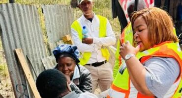MMC Eunice Mgcina engages with property owners and residents during the city’s enforcement operation in greater Ivory Park. Photo: MMC's Facebook