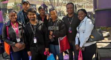 Emeris Waterfall, head of school computer science Handsome Mpofu (second from the right), with some of the campus students who attended this year’s AWS Summit Johannesburg, held at the Gallagher Convention Centre on August 17.