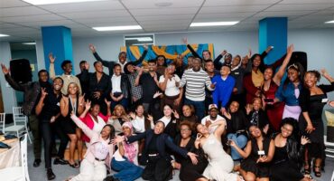 Some of the 50 students who were in attendance and the panellists celebrating the end of the Built to be Legends event, themed “Belong. Build. Become.” Photo: Supplied