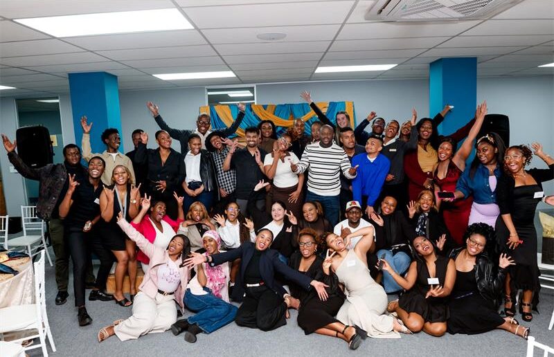Some of the 50 students who were in attendance and the panellists celebrating the end of the Built to be Legends event, themed “Belong. Build. Become.” Photo: Supplied