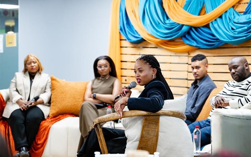 Panellists Hope Mathole, Otsile Lefete, Gina Koffman holding the mic, Kyle Gengiah, and Nhlanhla Dlamini engage with the students. Photo: Supplied