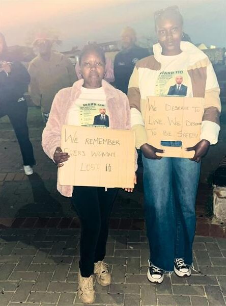 Mayibuye residents gather with candles and placards on September 18 to honour women who lost their lives to gender-based violence and femicide. Photo: Comfort Makhanya